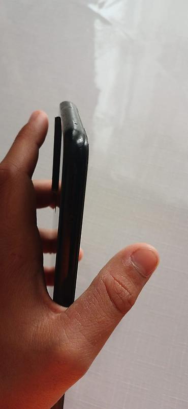 Mobil telefonlar: Xiaomi 64 GB, rəng - Qara, 
 Barmaq izi — 6
