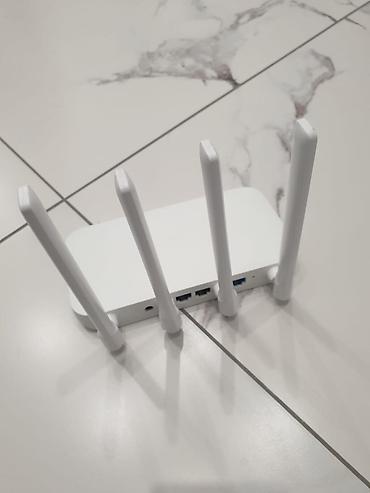 Модемы и сетевое оборудование: Xiaomi Mi Router 4C (R4CM) Продаю Wi-Fi роутер Xiaomi Mi Router 4C — 2