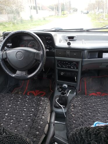 Daewoo: Model: Daewoo Nexia sedan Kuzov: 4 qapılı, gümüşü rəng — 9