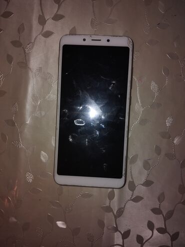islenmis telefonlar qiymetleri: Xiaomi Redmi 6, 32 ГБ, цвет - Золотой, 
 Сенсорный, Отпечаток пальца, Две SIM карты