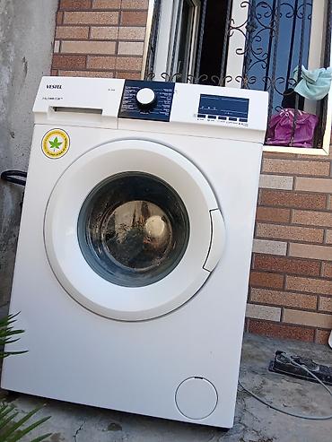 corab toxuyan: Vestel önyükləməli paltaryuyan maşın - Model: VP 7104 (paneldə qeyd — 1