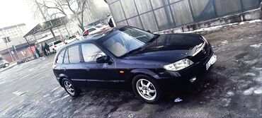 Mazda: Mazda 323: 2002 г., 1.6 л, Механика, Бензин, Хэтчбэк