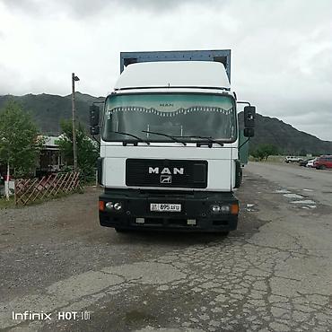мобильный азс: Грузовой автомобиль MAN с прицепом, переделанный под кочевую пасеку — 1