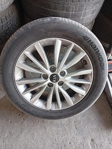 Унаа: Литой диск KIA с шиной Hankook - Оригинальный литой диск KIA — 1