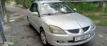 Mitsubishi: Серебристый седан Mitsubishi Lancer с четырехдверным кузовом, идеально — 6