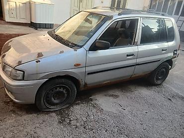 аренда mazda: Mazda Demio: 1999 г., 1.3 л, Механика, Бензин, Хэтчбэк — 2