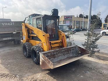 Mini yükləyici (skid steer) – ön kovalı, kompakt və çevik həll - Tip