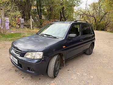 ann chery: Mazda Demio: 2001 г., 1.5 л, Механика, Бензин — 1
