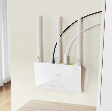 Модемы и сетевое оборудование: Маршрутизатор Wi-Fi HOCO HI30 - это устройство, которое обеспечивает — 2