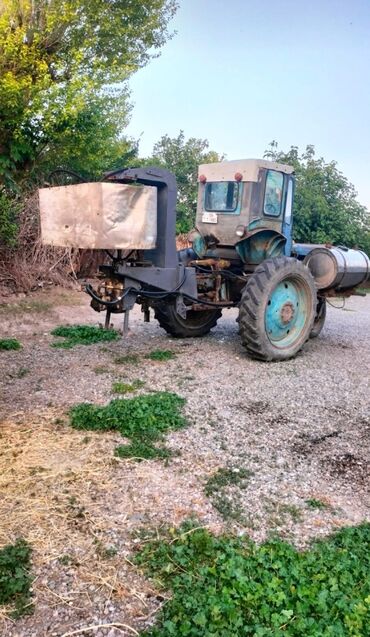 qezalı maşın: Traktor İşlənmiş
