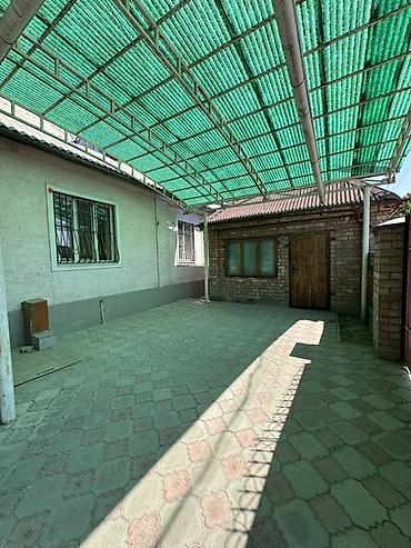 дом пр: Продаётся кирпичный дом с большим двором и навесами. - Материал — 2