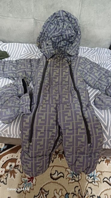 комбинезон для новорожденных зимний: Детский зимний комбинезон-конверт с капюшоном. - Теплый