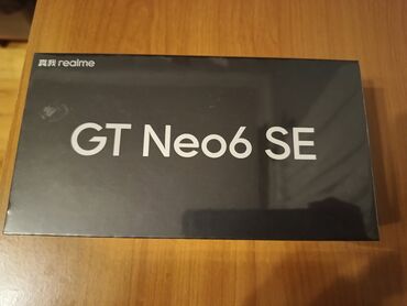 telefon klaviaturasi: Realme GT Neo 6 SE, 256 GB, rəng - Gümüşü, Barmaq izi, İki sim kartlı, Face ID