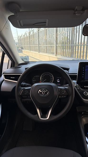 икс трейл: Toyota Corolla: 2022 г., 1.8 л, Вариатор, Гибрид, Седан — 5