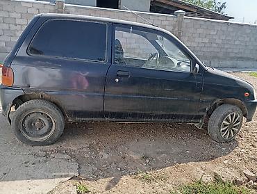 водный мото: Daihatsu Cuore: 1999 г., 0.8 л, Механика, Бензин, Хэтчбэк — 3