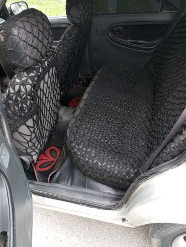 Daewoo: Model: Daewoo Nexia sedan Kuzov: 4 qapılı, gümüşü rəng — 11