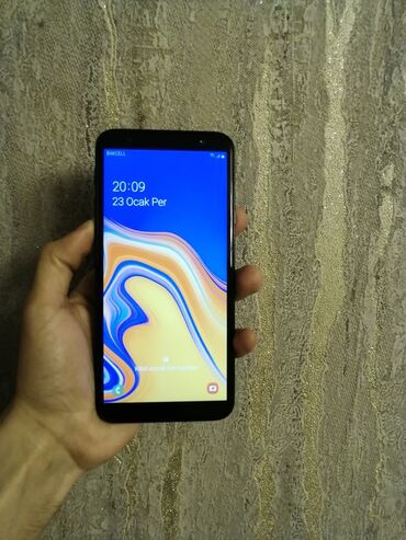 Samsung: Samsung Galaxy J4 Plus, 16 GB, rəng - Qara, Sensor, İki sim kartlı, Face ID