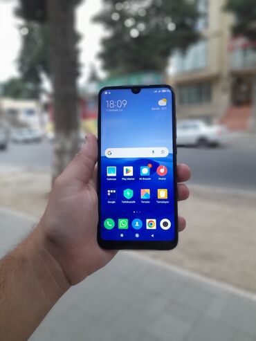 duymeli telefon: Xiaomi Redmi 7, 32 GB, rəng - Qara, 
 Sensor, Barmaq izi, İki sim kartlı