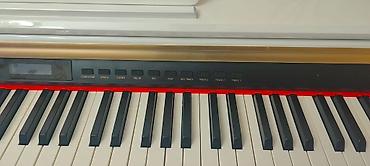pıano: Təzədir heç işlənməyib 2000manata piano alınıb masası isə — 2