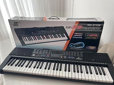 гитара купить баку: 🎹 Pianino Satılır 255 səs tonu, 255 ritm, 50 demo mahnısı var — 2