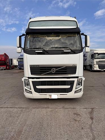 вольво тандем: Тягач, Volvo, 2012 г., Шторный — 3
