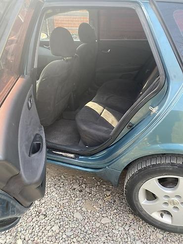 авто домик: Nissan Primera: 2002 г., 1.8 л, Механика, Бензин, Универсал — 8