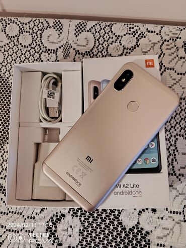 mi telefon: Xiaomi Mi A2 Lite, 32 GB, rəng - Qızılı, 
 Sensor, Barmaq izi, İki sim kartlı