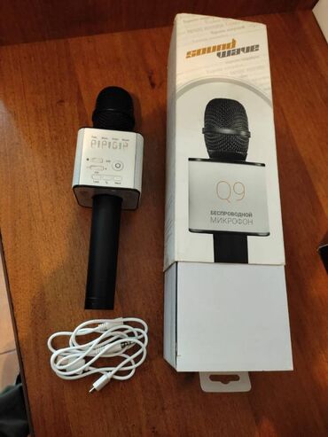 Продаю беспроводной микрофон Q9, практически новый