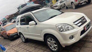 купить хонда срв 4 поколения: Honda CR‑V (поколение 2002–2006), белый кроссовер 5‑дверный. Ключевые