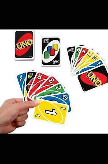 usaq oyuncaqlari per page 40: UNO kart oyunu – ailəvi əyləncə üçün klassik seçim. Qutuda rəngli və — 2