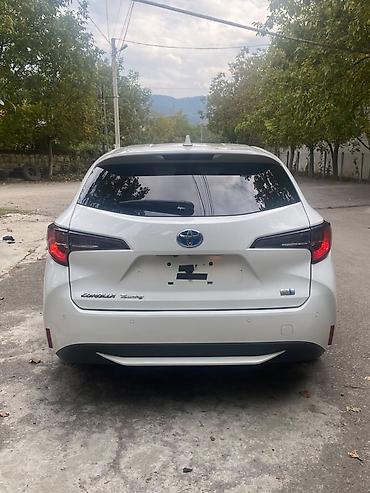 toyota bakı: Toyota Corolla Touring Sports Hybrid – ağ rəngli universal kuzov — 2