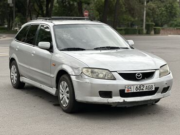 Kia: Mazda 323: 2003 г., 1.6 л, Механика, Бензин, Хэтчбэк