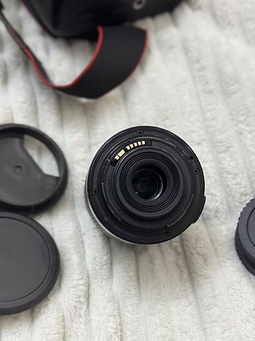 canon eos 1100d: Canon EOS 1100D DSLR fotoaparat dəsti Xüsusiyyətlər: - 12 MP APS-C — 4
