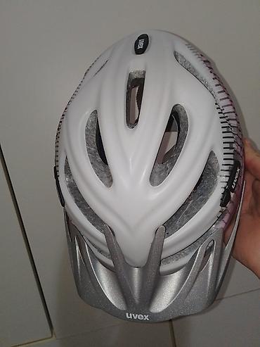 Oprema za bicikliste: Uvex biciklistička kaciga vel obim 52-57 - Brend/model: Uvex (logo na — 12