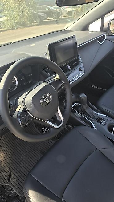 tayota karolla: Toyota Corolla: 2022 г., 1.8 л, Вариатор, Гибрид, Седан — 8