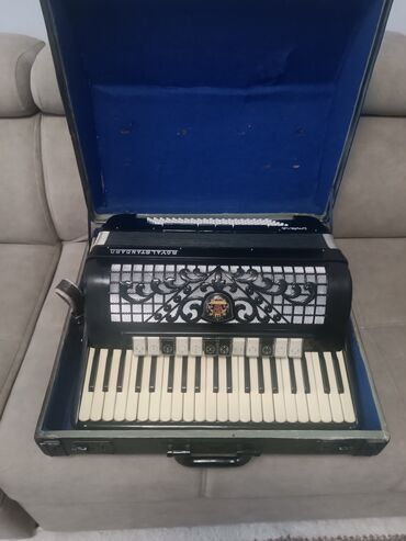 Аккордеоны: Аккордеон Weltmeister - Клавиатурная гармоника (правая рука — — 9