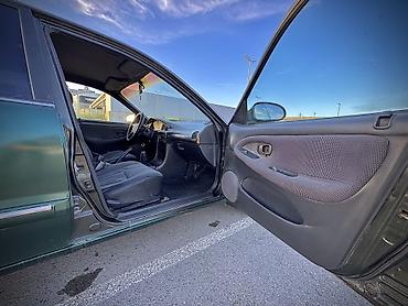 Hyundai: Hyundai Sonata: 2 l | 1997 il Sedan — 14