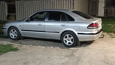радиатор на опель вектра б: Mazda 626: 1998 г., 2 л, Механика, Бензин, Хэтчбэк