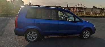 mазда демио: Mazda PREMACY: 2000 г., 1.8 л, Механика, Газ, Универсал — 9