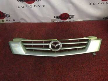 Крышки багажника: Решетка Mazda Demio DW3W 1300 2001 (б/у) ДВИГАТЕЛЬ / АКПП - в наличии