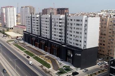 Riyad ticarətin yanı dost xidmətin arxasındakı bina