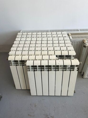ev qizdiricilar: Seksiyalı Radiator