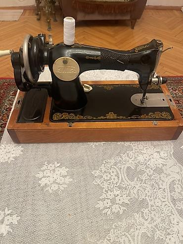 Tikiş maşınları: Mexaniki tikiş maşını – stolüstü, qoldan fırladılan model — 6