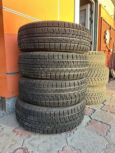 резина зимняя 15: Шины 215 / 70 / R 15, Зима, Новый, Комплект, Легковые, RoadX — 1