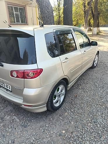 айни 95: Mazda Demio: 2005 г., 1.5 л, Автомат, Бензин, Хэтчбэк — 6