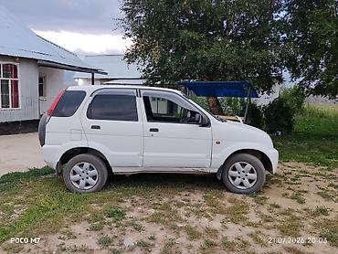 jac авто: Toyota Cami: 2004 г., 1.3 л, Автомат, Бензин, Кроссовер — 1