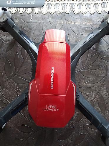 Oyuncaq helikopterlər: Oyuncaq kvadrokopter dron - Korpus rəngləri: bənövşəyi və qırmızı — 2