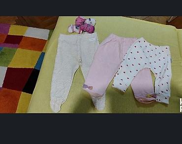 Kompleti: Paket za devojcice uzrasta 6-9 meseci. Od svih komada nosen je braon — 4
