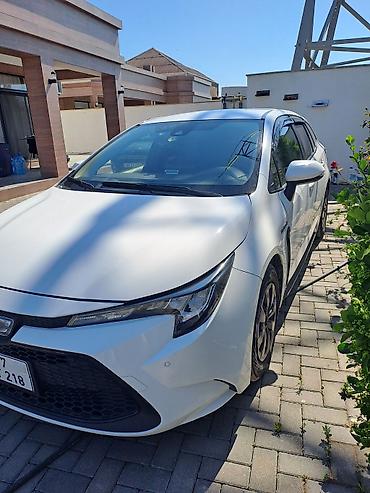 elit ehtiyat hisseleri: Toyota Corolla Touring Sports Hybrid – universal kuzovlu, ağ rəng — 7