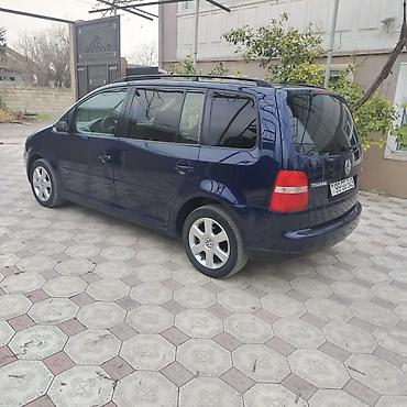 фольксваген тигуан л с: Volkswagen Touran, tünd mavi rəng, 5 qapılı kompakt miniven. - Geniş — 5